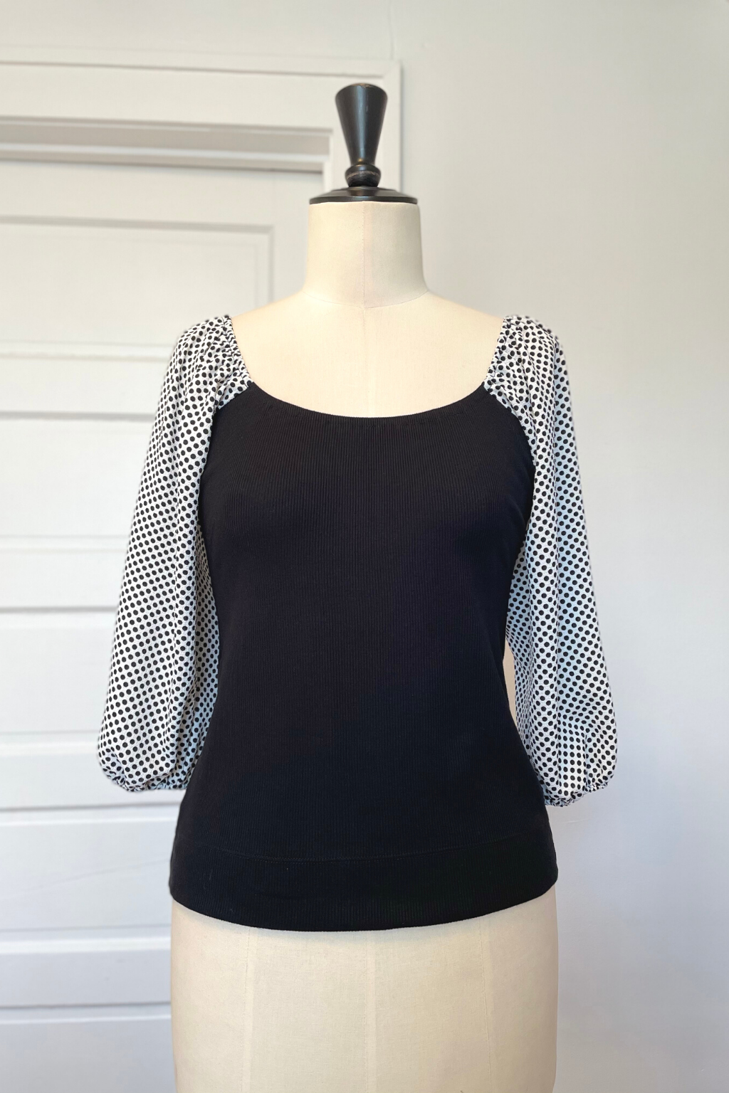 KOKOON Hutton Square Neck Top in Black Rib Knit With White and Black Polka Dot Sleeves Front