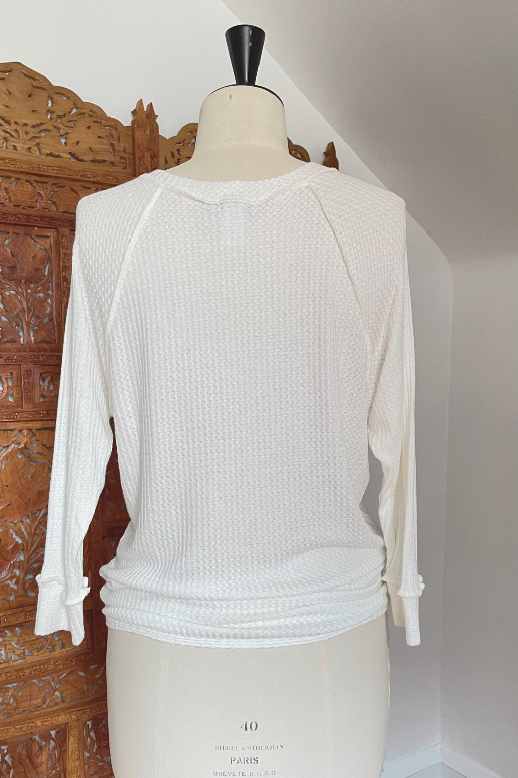 KOKOON Deep V Pullover in Ivory Waffle Knit Back On Mannequin